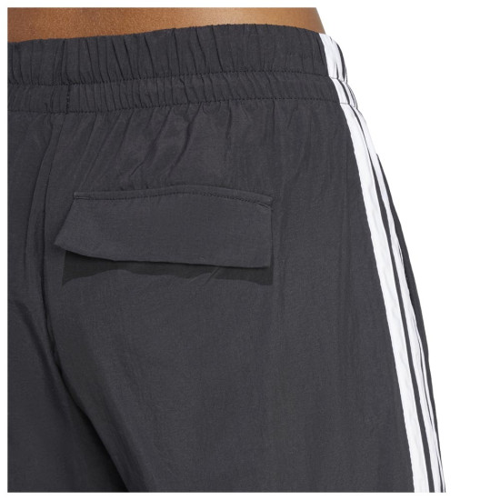 Adidas Γυναικείο παντελόνι φόρμας Essentials 3-Stripes Woven Parachute Pants Adidas Γυναικείο παντελόνι φόρμας Essentials 3-Stripes Woven Parachute Pants